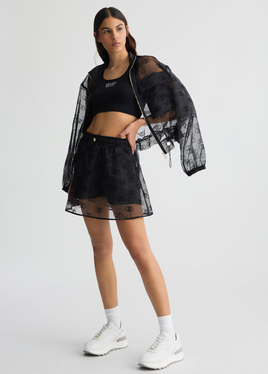 LIU JO Minigonna nera in organza stampata loghi all over con shorts in trasparenza