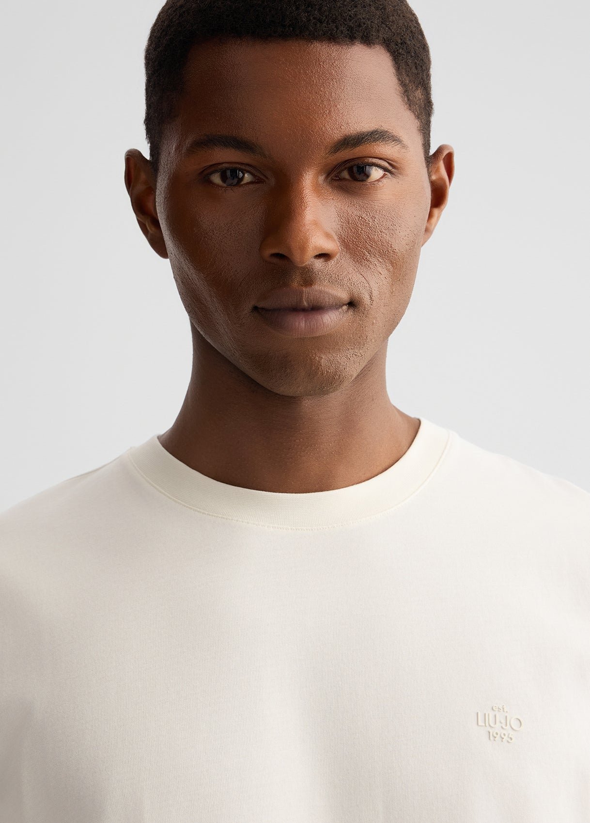 LIIU JO T-Shirt uomo maniche corte girocollo con logo piccolo gommato tono su tono
