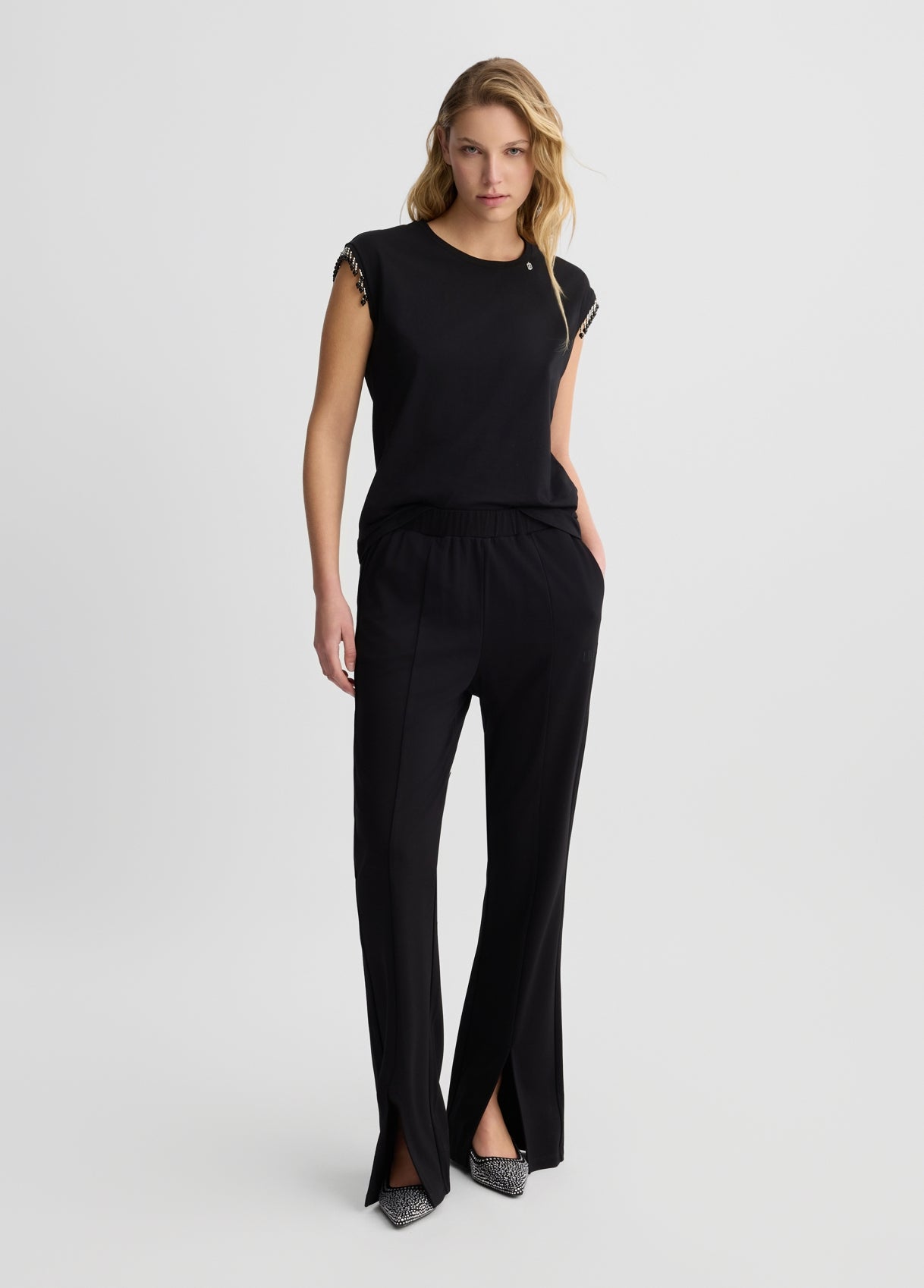LIU JO Pantaloni flare in jersey con spacco frontale nero e blu