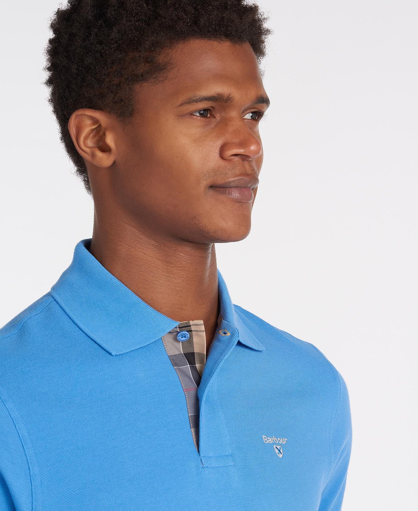 BARBOUR Polo uomo maniche corte in piquè con inserti tartan sotto ai bottoni e collo