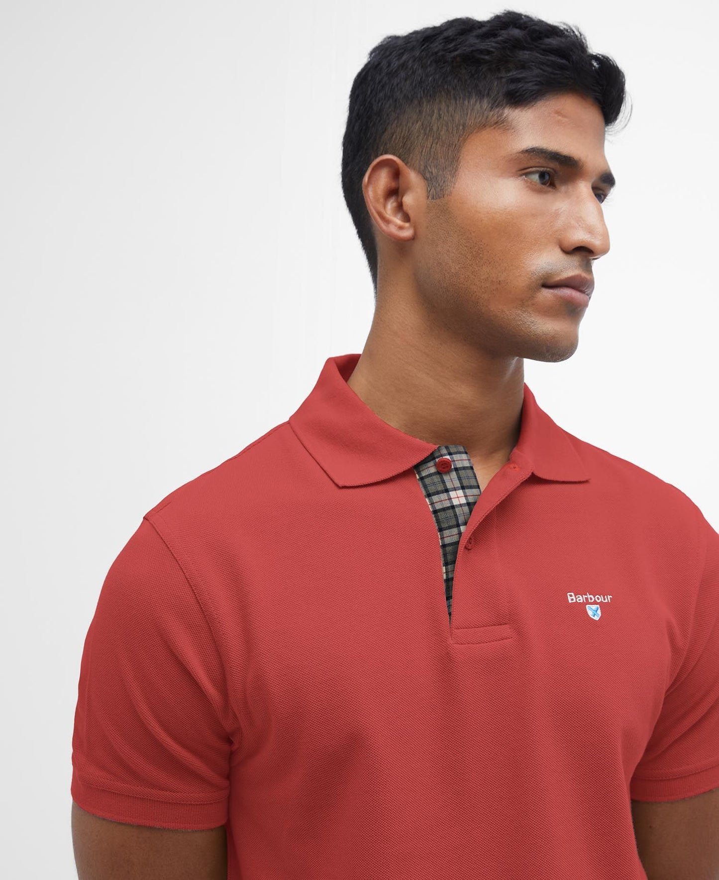 BARBOUR Polo uomo maniche corte in piquè con inserti tartan sotto ai bottoni e collo