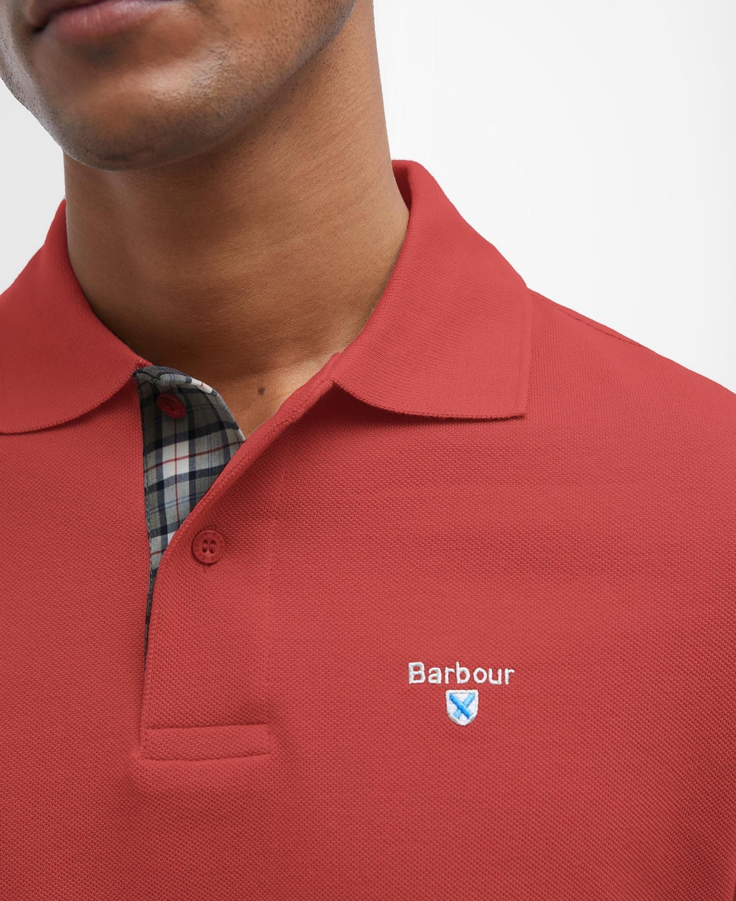 BARBOUR Polo uomo maniche corte in piquè con inserti tartan sotto ai bottoni e collo