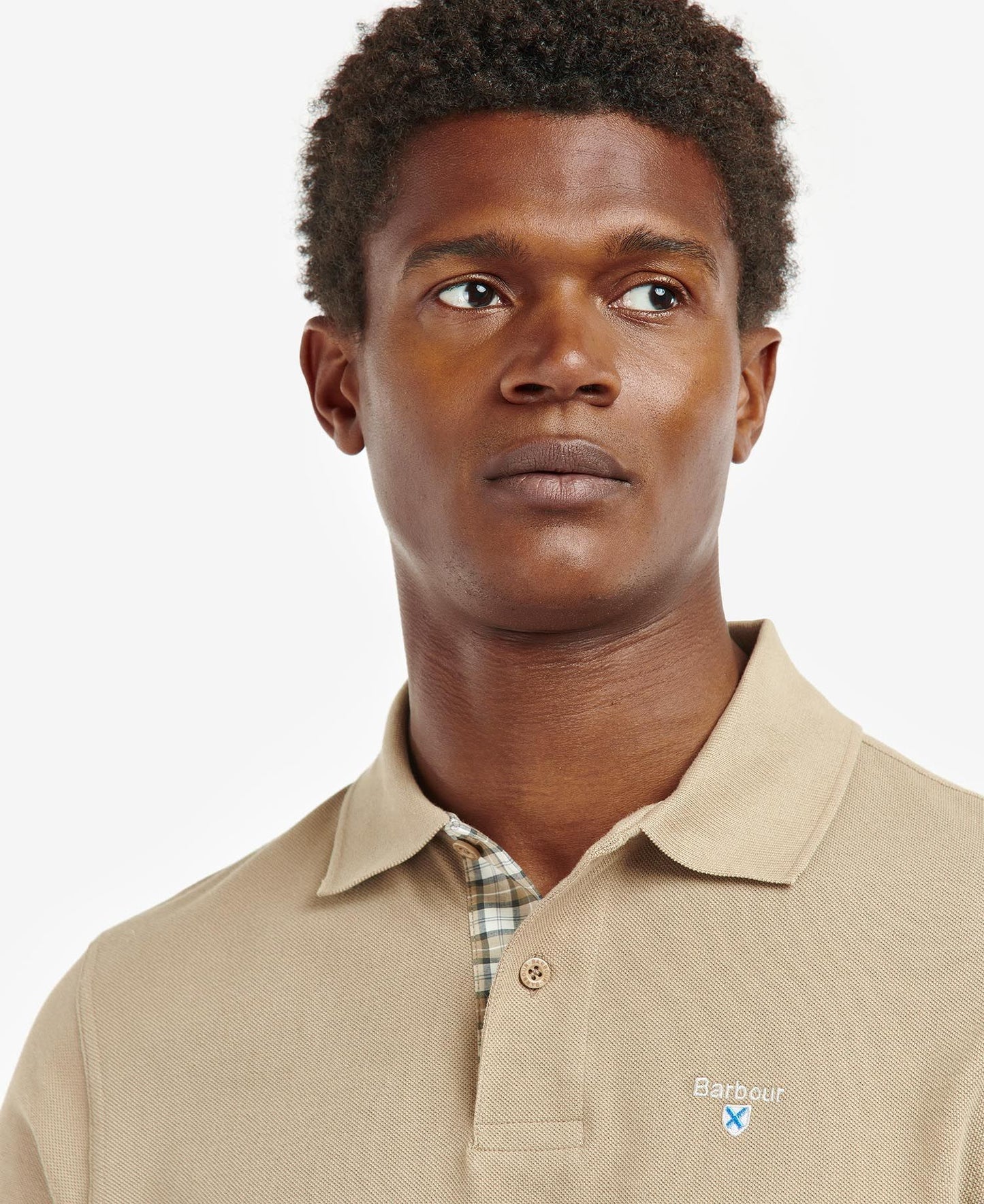 BARBOUR Polo uomo maniche corte in piquè con inserti tartan sotto ai bottoni e collo