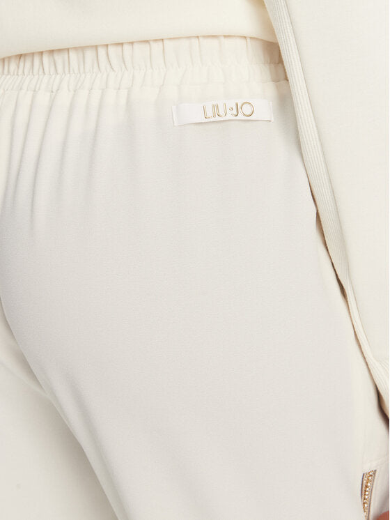 LIU JO Pantaloni jogger donna in crêpe stretch con bande laterali oro