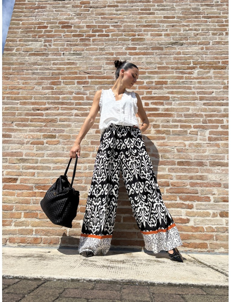 ANONYME Pantaloni palazzo in stampa