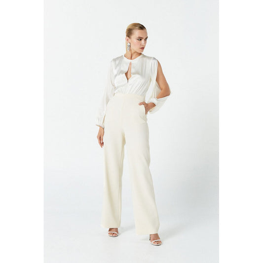 NENETTE Tuta panna elegante con schiena scoperta e maniche lunghe aperte