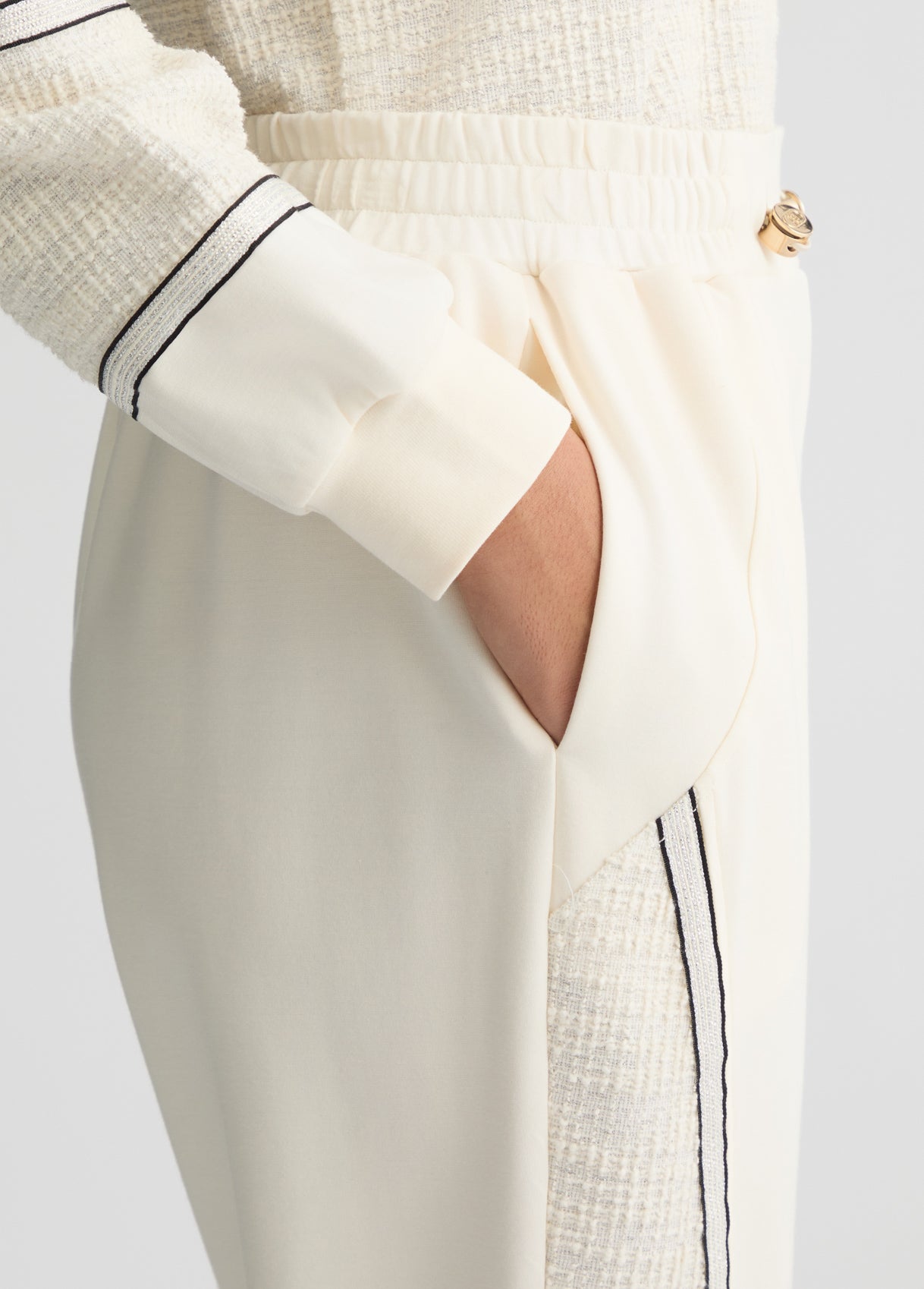 LIU JO Pantaloni donna jogger con inserto laterale bouclè lurex panna