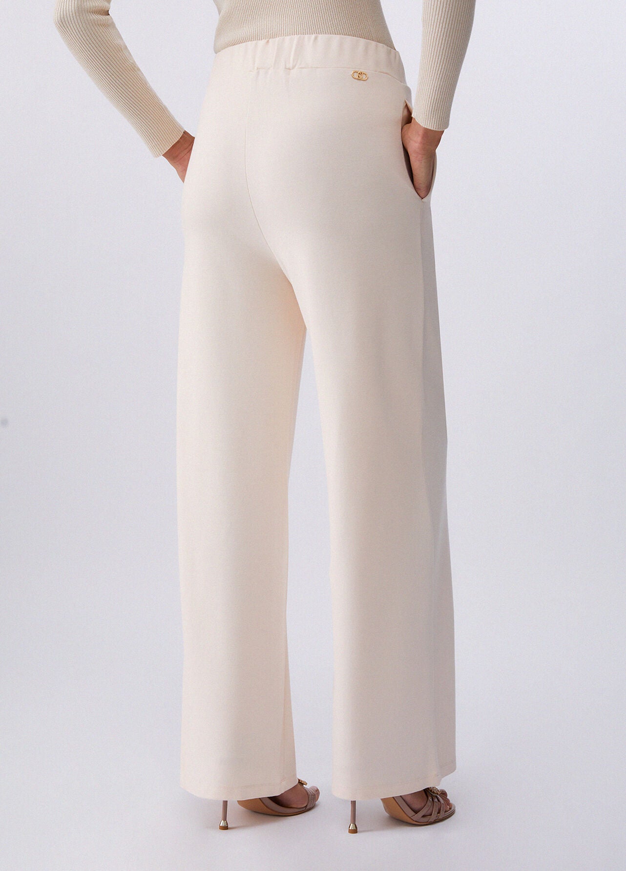 LIU JO Pantaloni donna in punto milano con spacchetti e fibbia oro