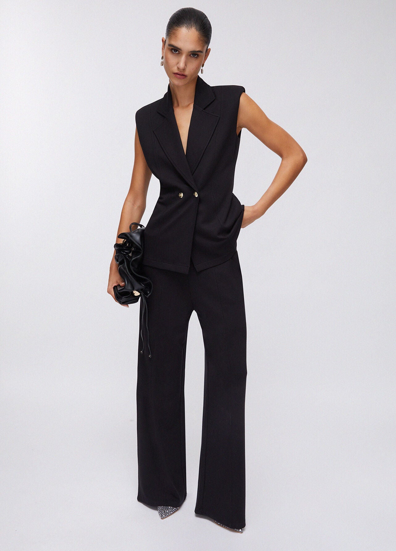 LIU JO Pantaloni donna in punto milano con spacchetti e fibbia oro