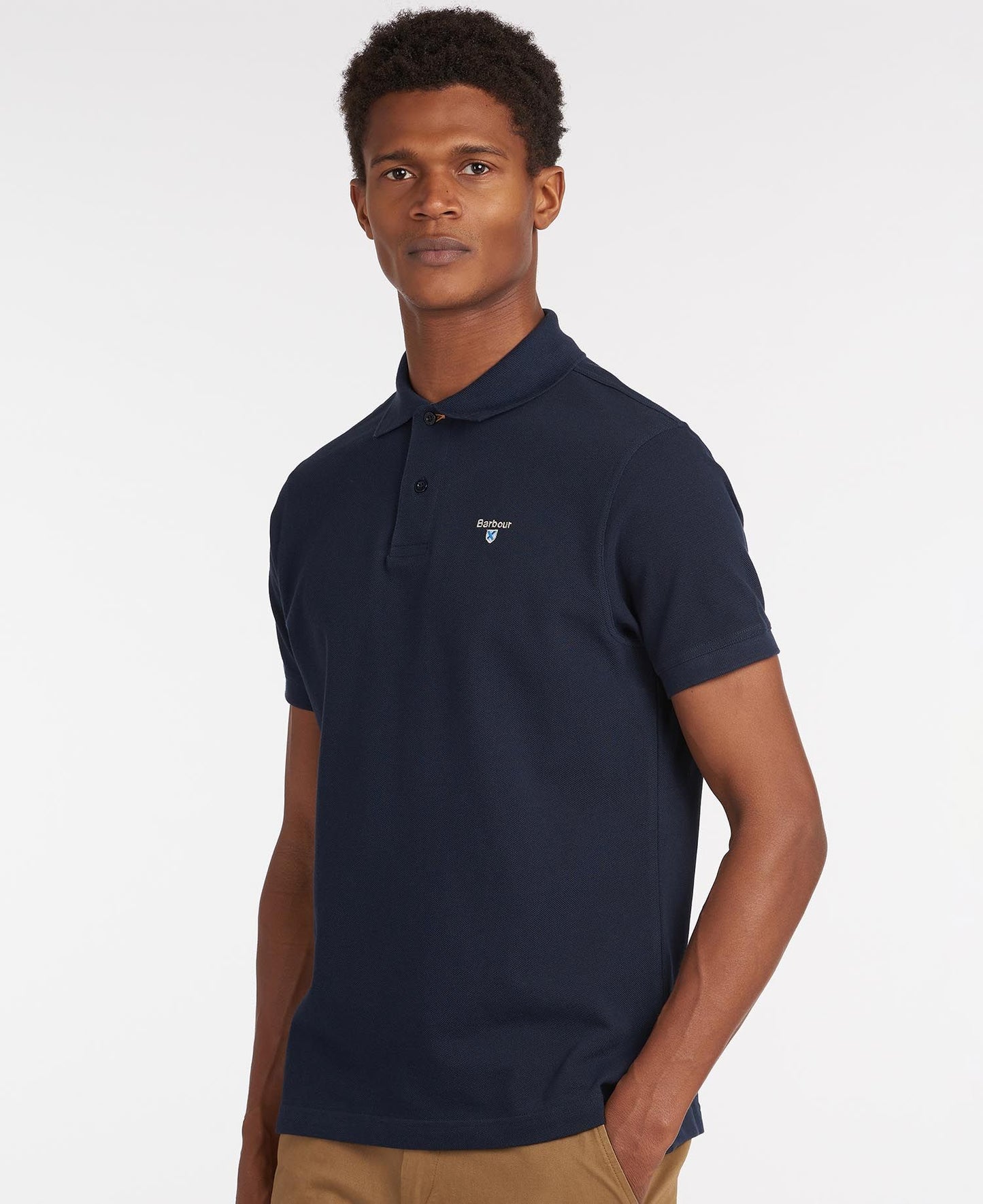 BARBOUR Polo uomo maniche corte in piquè con inserti tartan sotto ai bottoni e collo