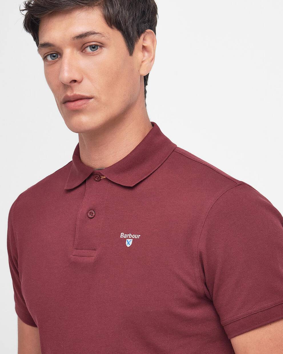 BARBOUR Polo uomo maniche corte in piquè con inserti tartan sotto ai bottoni e collo