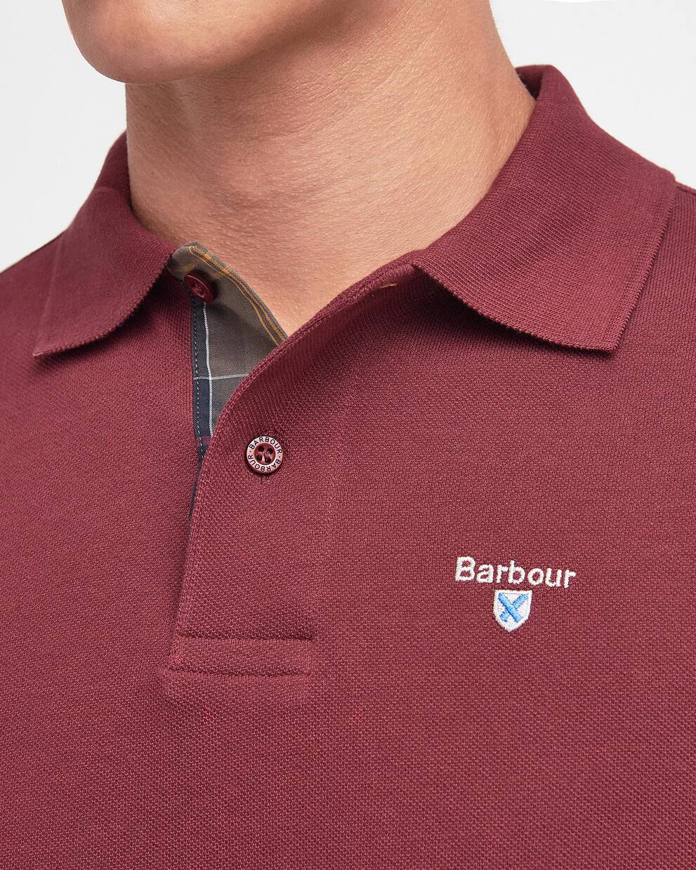 BARBOUR Polo uomo maniche corte in piquè con inserti tartan sotto ai bottoni e collo