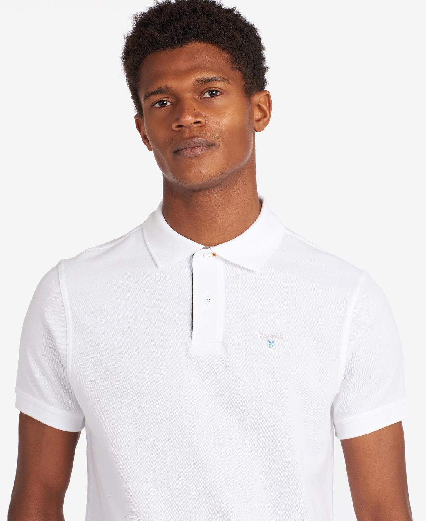 BARBOUR Polo uomo maniche corte in piquè con inserti tartan sotto ai bottoni e collo