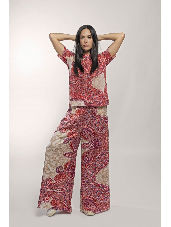 ANONYME DESIGNERS Pantaloni gamba larga in fantasia foulard rossa