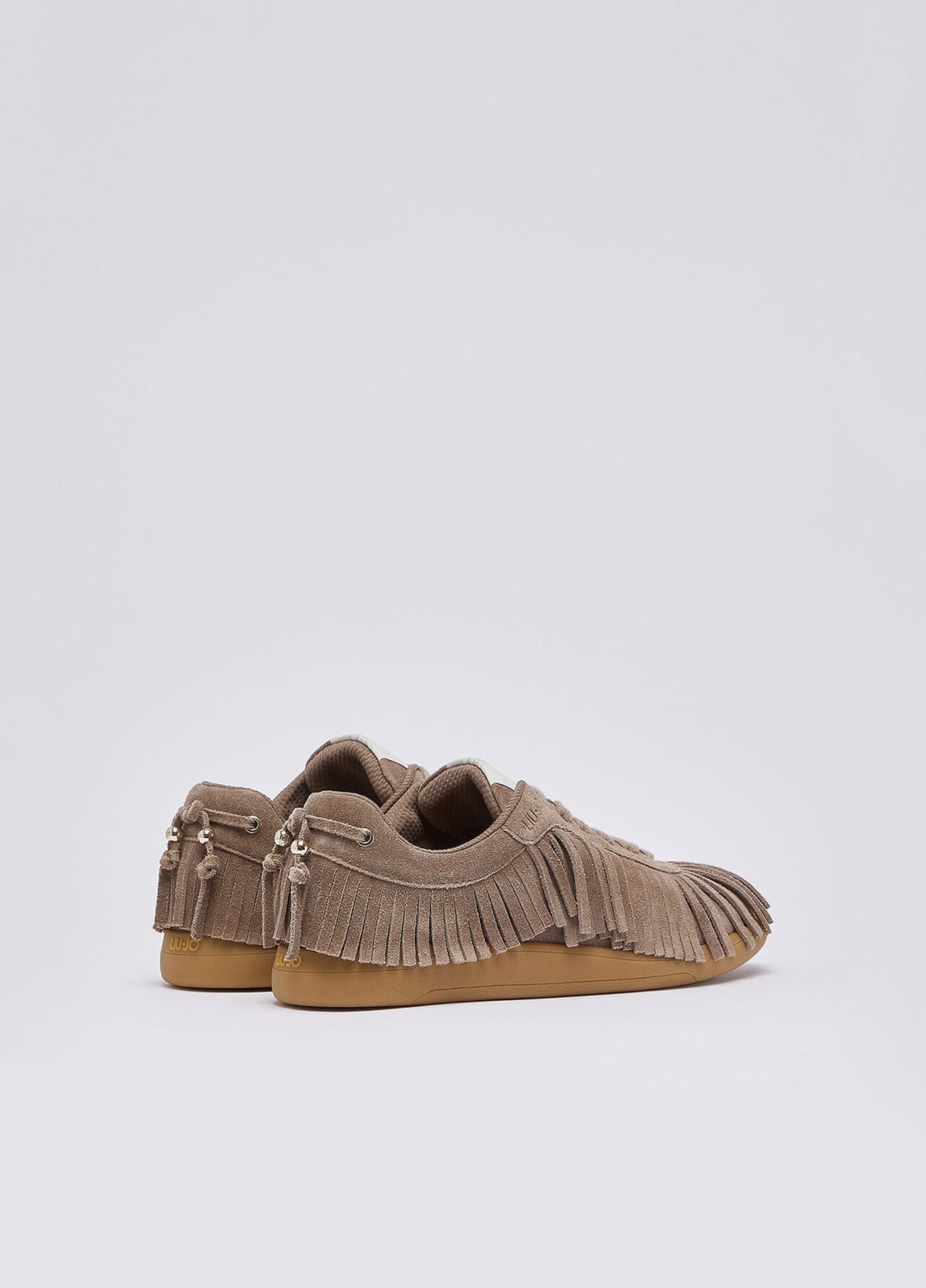 Sneakers in suede con frange