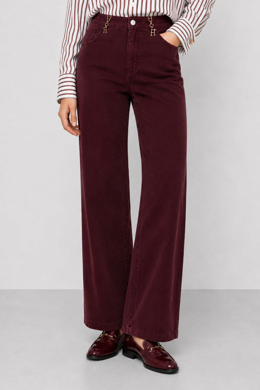 KOCCA Jeans color bordeaux gamba dritta e fibbiette oro